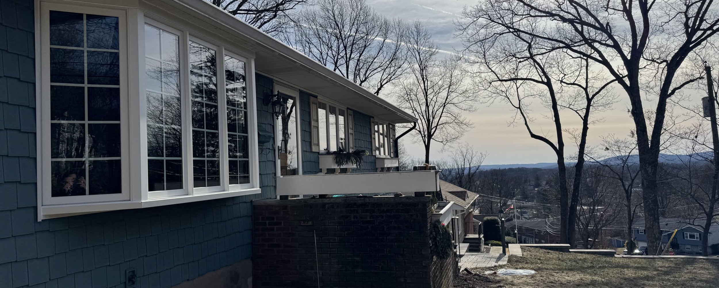 Roofer on black roof